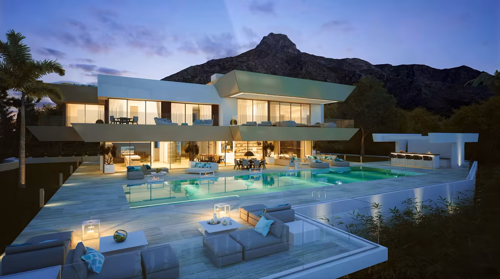Villa Silver at dusk: lit overhangs above the pool, with La Concha beyond